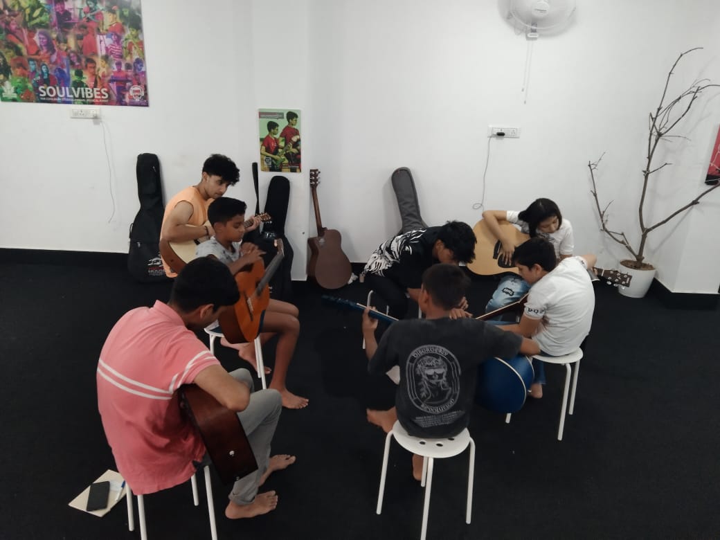 Energetic classroom with students engaged in music lesson